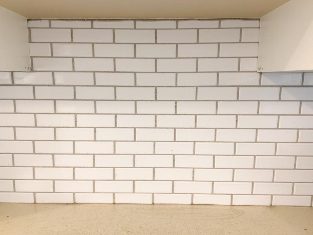 Kitchen backsplash with subway tile installation